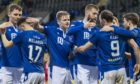 St Johnstone players come together to celebrate Chris Kane's goal.