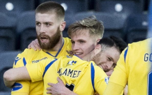 St Johnstone's Ali McCann celebrates with team-mates having put his side in the lead.