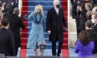President-elect Joe Biden and his wife Jill, walk out for the 59th Presidential Inauguration at the U.S. Capitol in Washington.