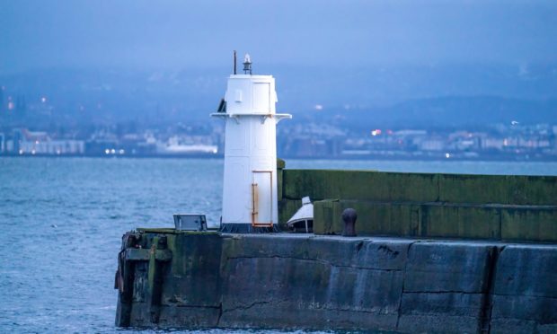 The lighthouse without its lantern after being struck by a Russian ship as it left Burntisland Harbour.