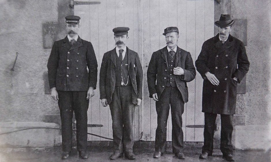 The Flannan Isles Lighthouse keepers. Left to right: Thomas Marshall, James Ducat and Donald Macarthur with NLB Superintendent Robert Muirhead.