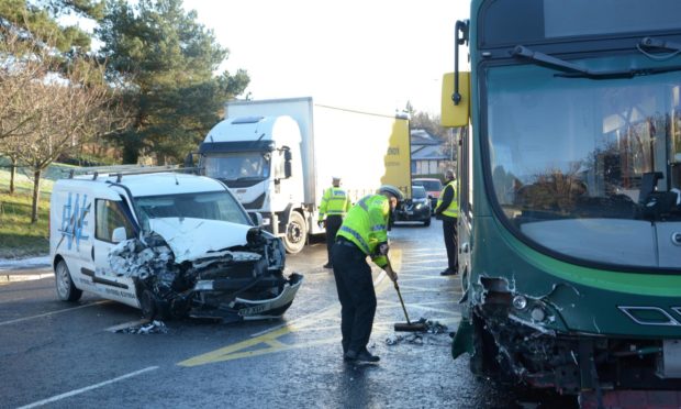 A van and a bus crashed on Logie Street.