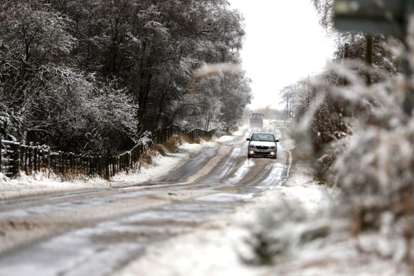 The Kirreimuir to Horney Cross road covered in snow.