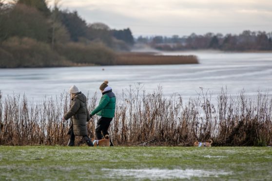 Forfar Loch is popular with walkers in all weathers.