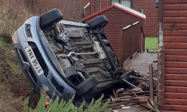 A car struck a power line when it crashed near Loch Leven.