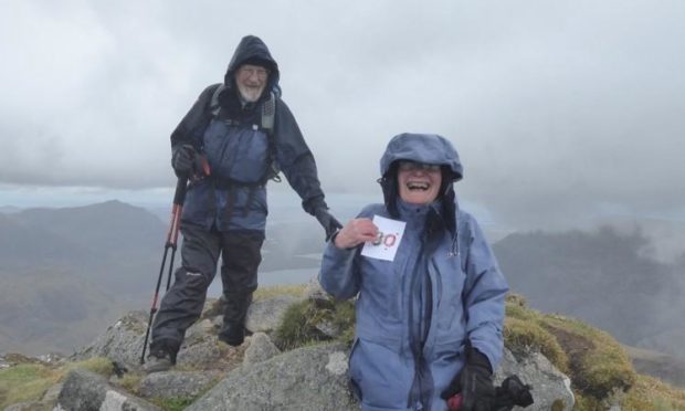 Margaret and husband Roger at the summit of A'Mhaighdean.