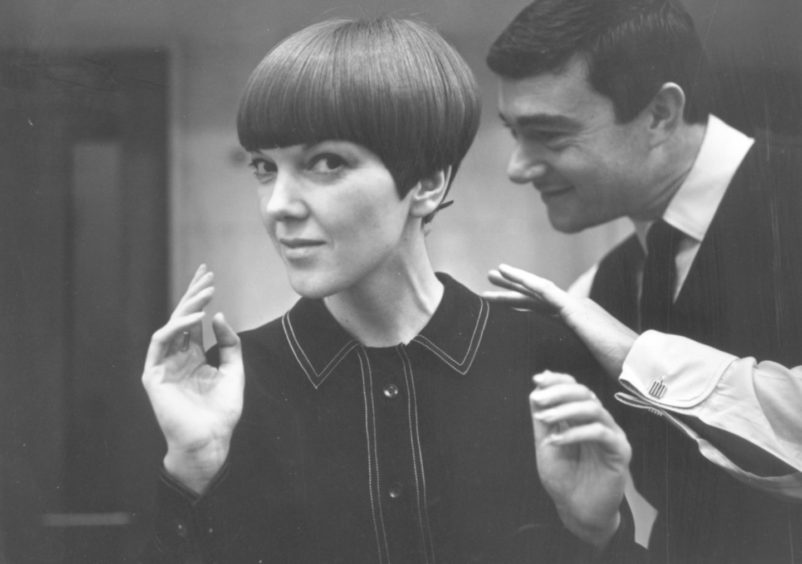 Clothes designer Mary Quant, one of the leading lights of the British fashion scene in the 1960s, having her hair cut by another fashion icon, hairdresser Vidal Sassoon.