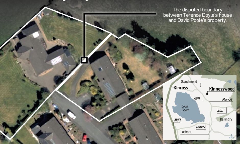 The disputed boundary line between Terence Doyle's and David Poole's properties.