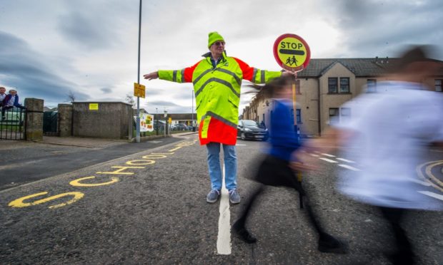 The driving prohibition would aim to keep children safe on their way to school.