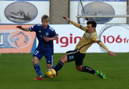 Lyall Cameron takes on Forfar while on loan at Peterhead.