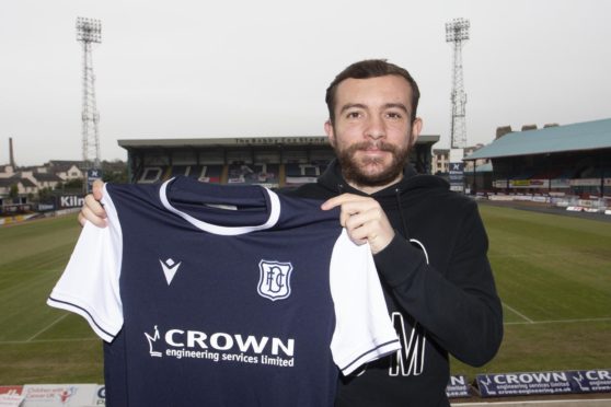 Paul McMullan will boost Dundee's Championship hopes after agreeing a loan switch.