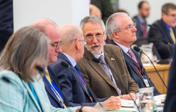 Lewis Simpson with council colleagues at a budget meeting in March 2020.