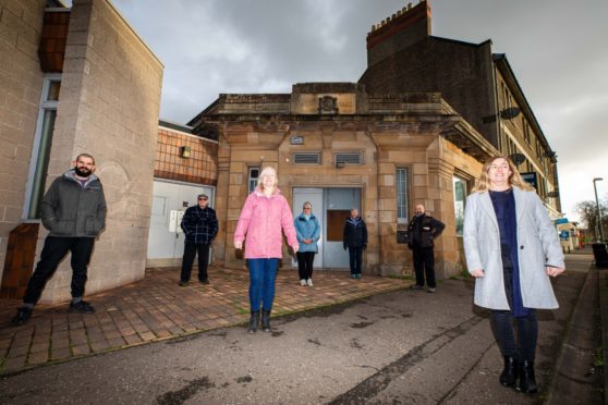 Rosyth EATS staff outside the former bank building that they plan to transform into a community hub.