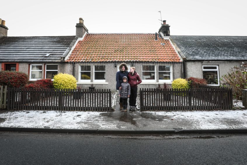 Natalie Jarvis, with her daughters Taylor, 12 and Darcy, 6 at home in Dairsie. Mhairi Edwards/DCT Media