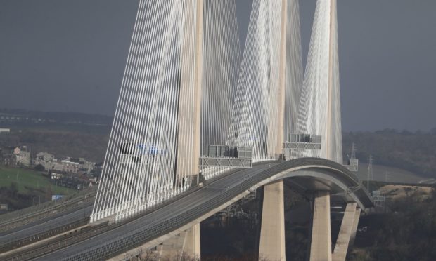 A patrol vehicle crosses The Queensferry Crossing after it was closed due to bad weather in February 2020.