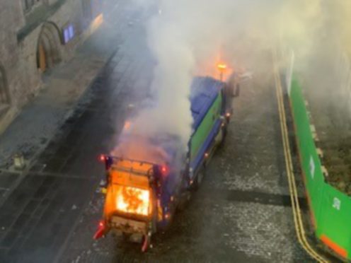 Smoke poured out of the bin lorry.