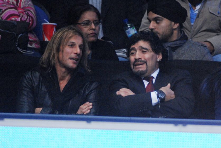 Claudio Caniggia and Diego Maradona pictured watching tennis in London in 2010.
