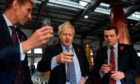 Boris Johnson and Scottish Conservatives leader Douglas Ross, left, enjoy a dram.