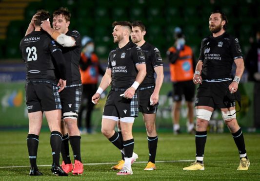 Ali Price (centre) after Glasgow's 23-22 win over Edinburgh.