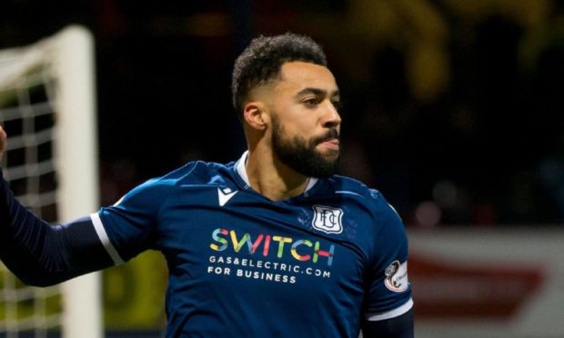 Kane Hemmings celebrates scoring for Dundee in March 2020.