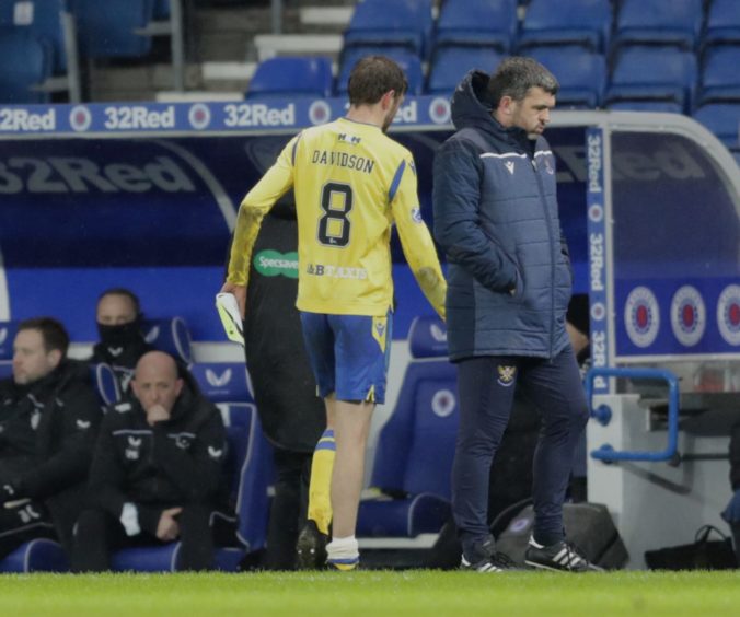 Murray Davidson limps off at Ibrox during Rangers clash.