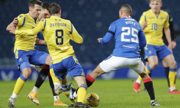 Editorial use only Mandatory Credit: Photo by Stuart Wallace/BPI/Shutterstock (11743857m) Kemal Roofe of Rangers fouls Murray Davidson of St. Johnstone Rangers v St Johnstone, Scottish Premiership, Football, Ibrox Stadium, Glasgow, Scotland, UK - 03 Feb 2021