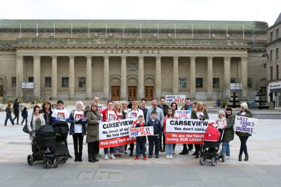 Campaigners previously gathered outside the Caird Hall in Dundee to call for changes to be made to mental health services