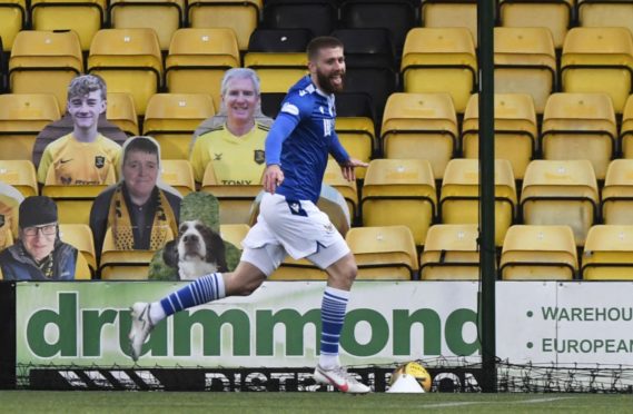 Shaun Rooney races away after scoring.