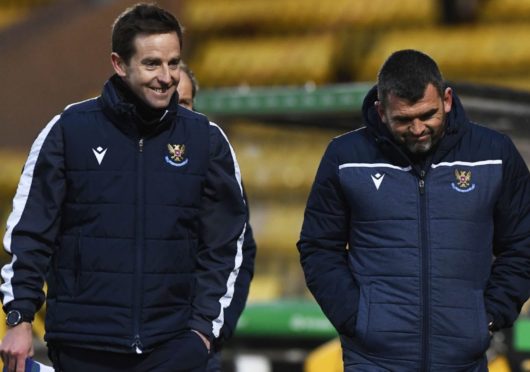 Callum Davidson and Steven MacLean helped clear some snow at McDiarmid Park.