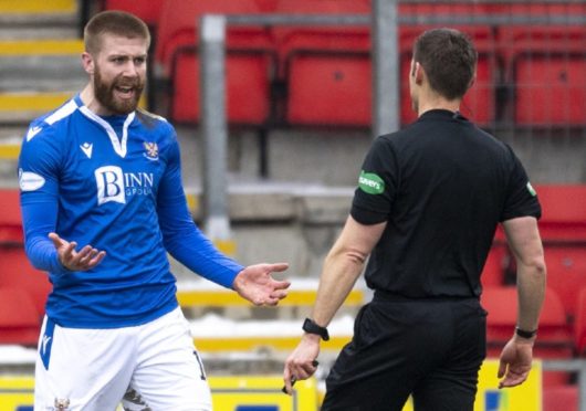 St Johnstone's Shaun Rooney claims for a second half penalty.