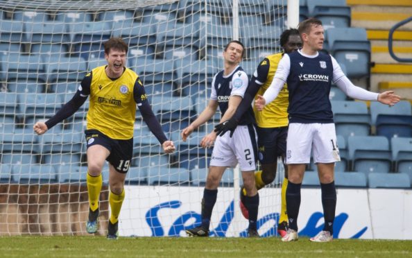 Queen of the South's Rhys Breen celebrates making it 2-0 at Dens Park.