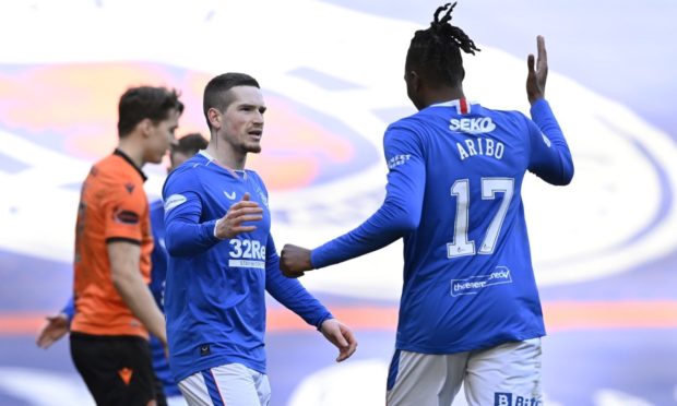 Joe Aribo congratulates Ryan Kent after he doubled the hosts' lead.