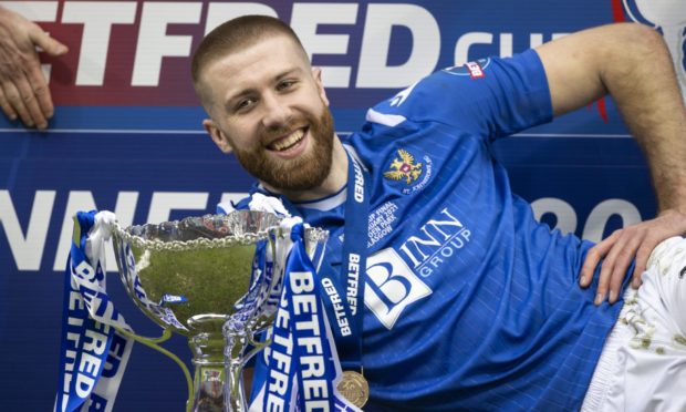 GLASGOW, SCOTLAND - FEBRUARY 28: St Johnstones Shaun Rooney celebrates with the Betfred Cup trophy during the Betfred Cup final between Livingston and St Johnstone at Hampden Stadium on February 28, 2021, in Glasgow, Scotland. (Photo by Craig Williamson / SNS Group)