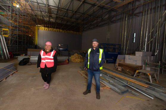 Montrose Playhouse project chairman David Paton and secretary Kristin Alexander inside the old main pool area.