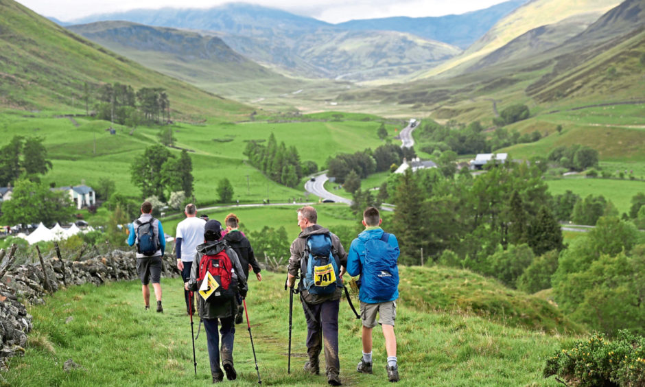 Walkers hike down to the Spittal of Glenshee during the 2017 Cateran Yomp.