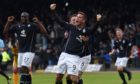 Peter MacDonald celebrates as Dundee are crowned winners of the Championship in 2014.