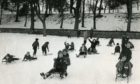 Fun in the snow at Lochee Park in December 1973.
