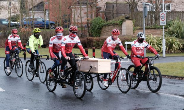 One last ride - Craig's coffin is carried to the crematorium.