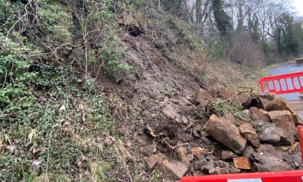 Severe weather has caused a landslip causing the closure of the main road to Dura Den.