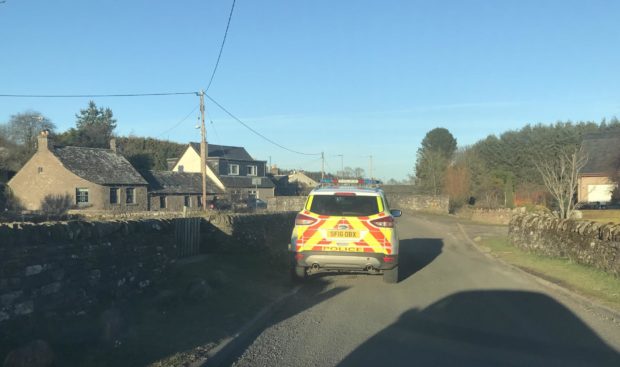 A police vehicle at Vinny Den in Letham.