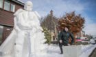 Douglas Roulston with his huge Mandalorian snowman.