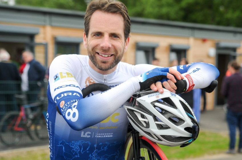 Mark Beaumont with cycling helmet and lycra