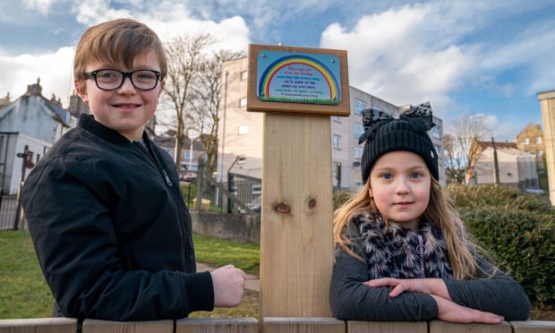 Jasper and Rose unveiled the plaque.