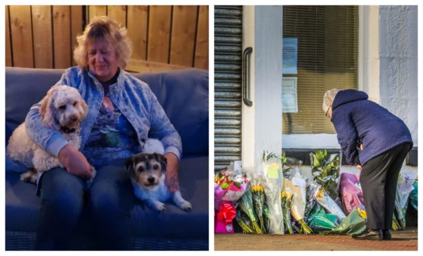 Margaret Wares, with Jackadoodle Dizzy on the right, and her daughter's dog Ruby on the left, and flowers outside her business The Laird's Larder, Monifieth.