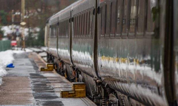 Portable steps are used to help people get on and off trains at the Dunkeld and Birnam Railway Station.