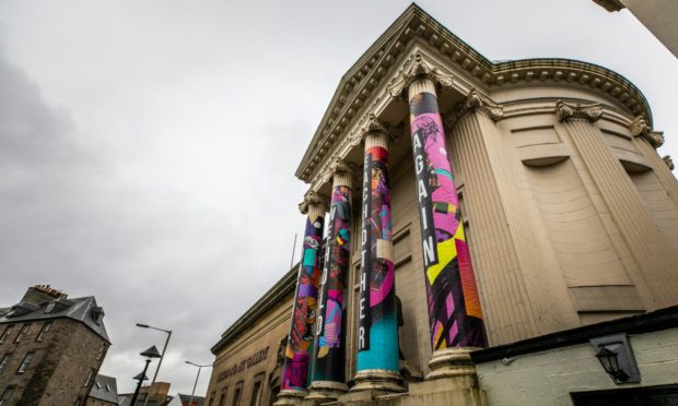 New artwork has been wrapped around columns at Perth Museum and Art Gallery.