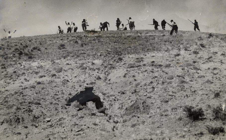 An attack on a northern Spanish hill during the Spanish Civil War. Image: Shutterstock.