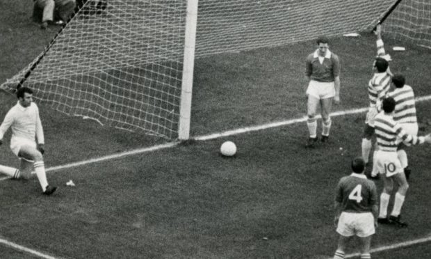 Jimmy Donaldson can't prevent Bertie Auld's winner for Celtic.