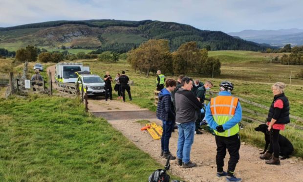 Rescuers flock to the remote site after Gordon Paterson was trampled.