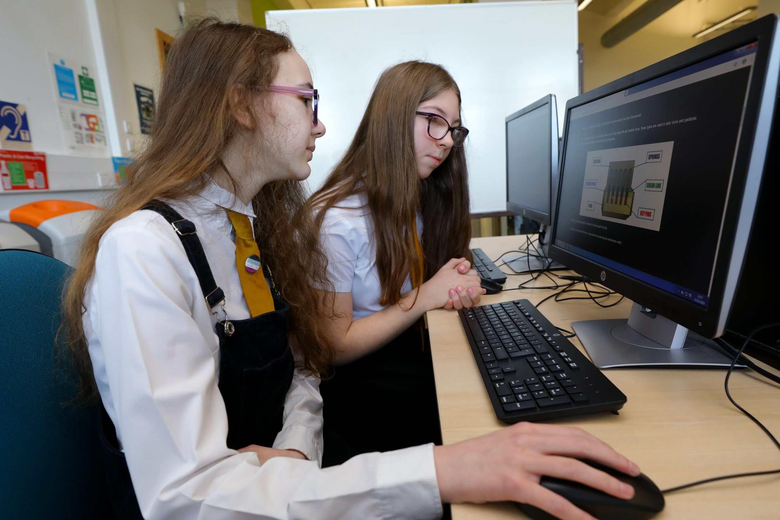 Criagie High School pupils Lea McLeod, left, and Keraleigh Simpson, at the Password Cracking workshop at Abertay University in Dundee